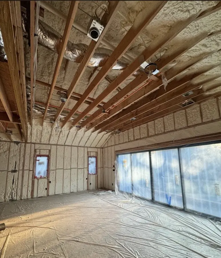 Interior walls and ceiling insulated with spray foam during new construction in Sioux City